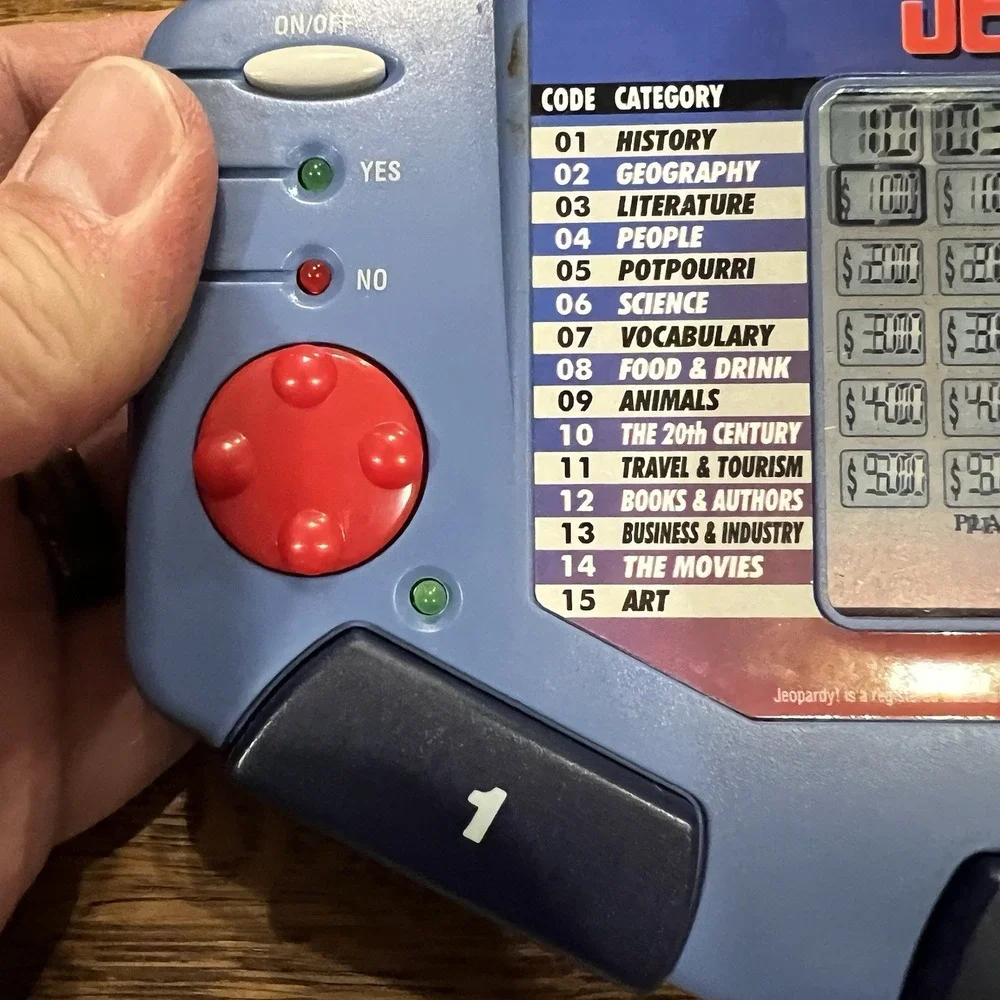 Tiger Electronics Jeopardy Hand Held Game With Cartridge & Answer Question Book